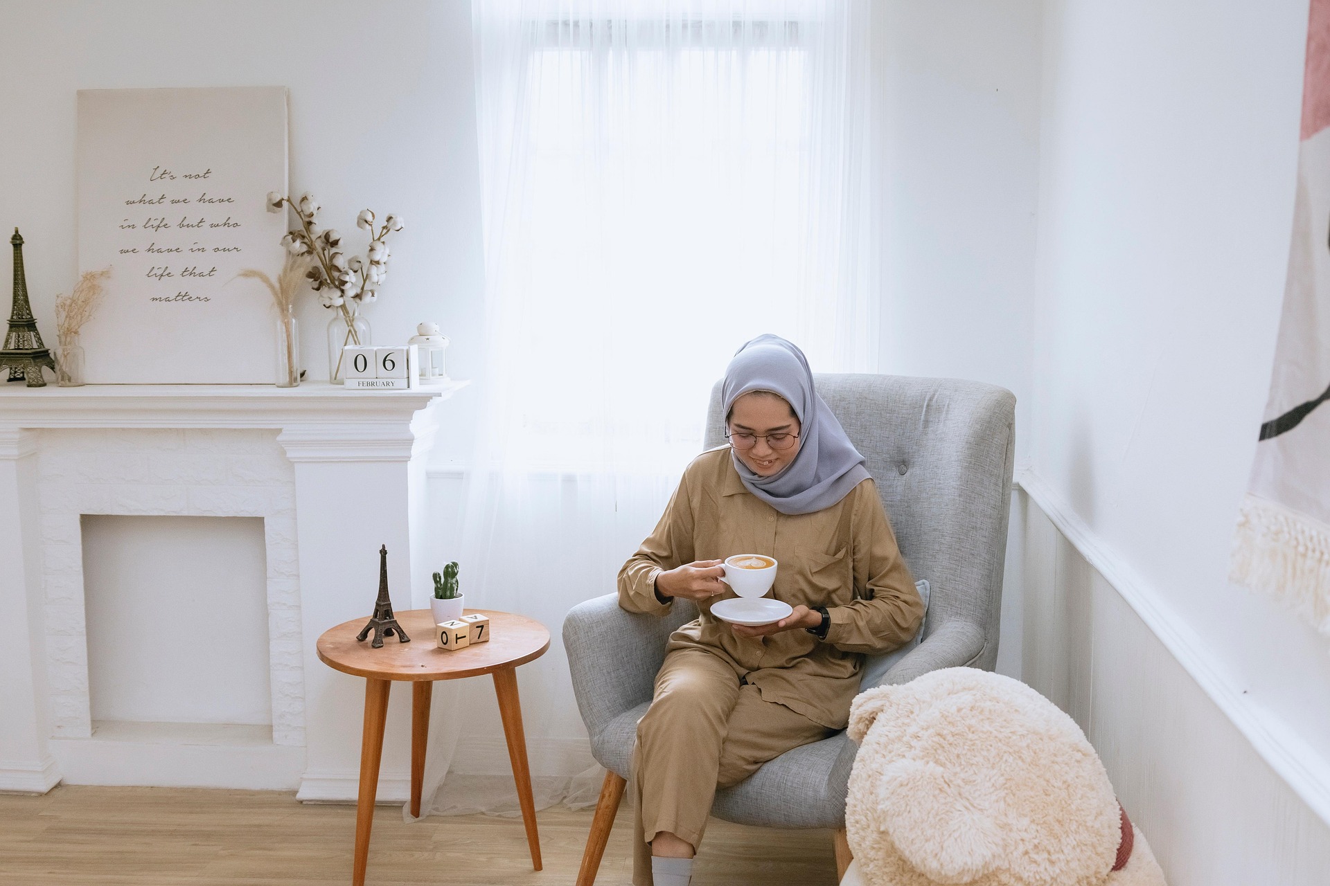 A woman sipping coffee