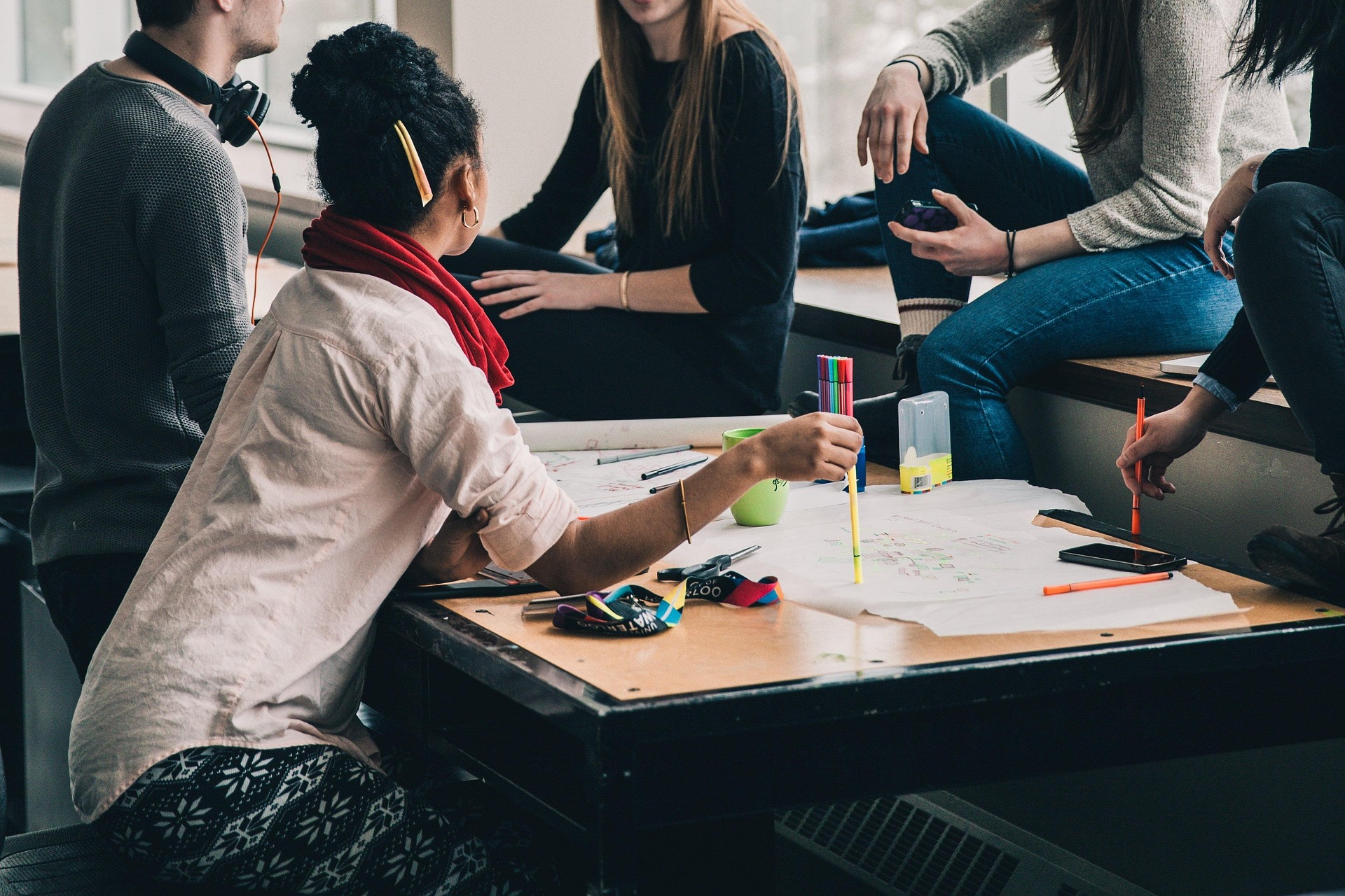People discussing in a work setting