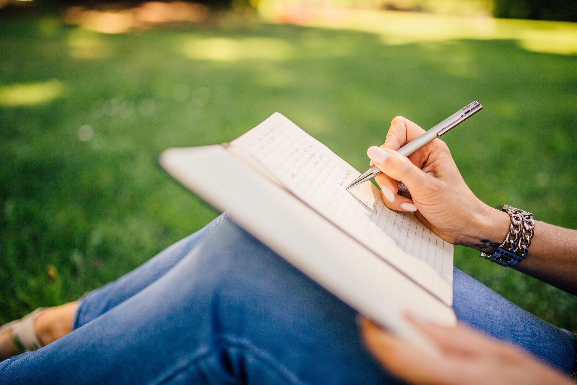 A Woman writing a Journal